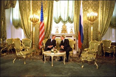 After a joint press conference, President Bush talks privately with Russian President Vladimir Putin at the Kremlin in Moscow May 24.