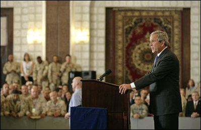 President George W. Bush speaks to U.S. troops and U.S. embassy personnel during an unannounced 5-hour trip to Baghdad, Iraq, Tuesday, June 13, 2006. "These are historic times," said the President. "The mission that you're accomplishing here in Iraq will go down in the history books as an incredibly important moment in the history of freedom and peace; an incredibly important moment of doing our duty to secure our homeland." White House photo by Eric Draper 