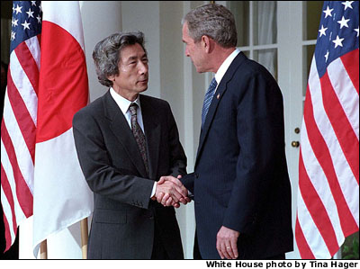 President Bush and Japanese Prime Minister Junichiro Koizumi conduct a joint press conference in the Rose Garden Sept. 25. "We Japanese are ready to stand by the United States to fight terrorism," said the Prime Minister. 