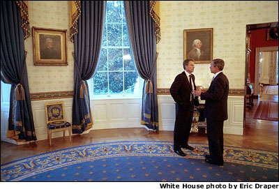  A few hours before addressing Congress and the nation, President Bush talks privately with British Prime Minister Tony Blair in the Blue Room at the White House Sept. 20. WHITE HOUSE PHOTO BY ERIC DRAPER 