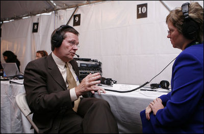 Secretary Michael O. Leavitt of the Department of Health and Human Services, speaks with radio journalist Sue Henry of radio station WILK in Scranton, Wilkes Barre, Pa., at White House Radio Day Tuesday, Oct. 24, 2006.