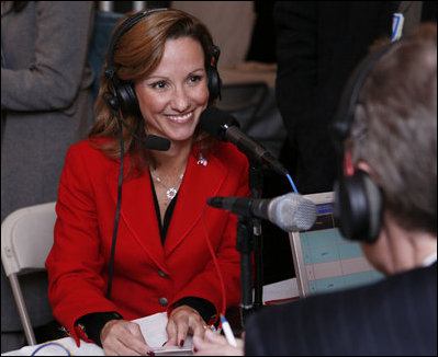 Fran Townsend, Assistant to the President for Homeland Security, talks with a radio journalist during the White House Radio Day Tuesday, Oct. 24, 2006.