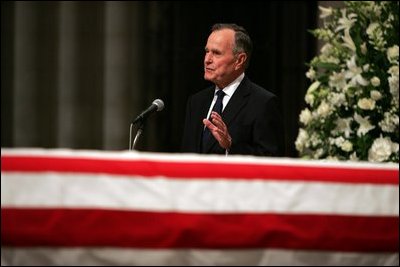 Former President George H.W. Bush delivers a eulogy for former President Ronald Reagan during the funeral service at the National Cathedral in Washington, DC on June 11, 2004. 