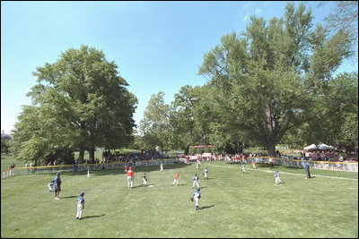 The Uniondale Little League Sluggers of Uniondale, N.Y., battled for bases with the 6&11 Little League Sluggers from Trenton, N. J., on a quiet, sunny corner of the White House South Lawn Sunday, May 5, 2002.