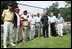 President George W. Bush, joined Baseball Hall of Fame player and honorary tee ball commissioner Frank Robinson, center, along with Hall of Fame manager Tommy Lasorda and fellow legendary players, retire the number of baseball great Jackie Robinson at the White House Tee Ball Game Sunday, July 15, 2007, on the South Lawn of the White House. All players wore the number 42 to celebrate the legacy of Jackie Robinson.