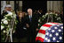 Vice President Dick Cheney holds the hand of former first lady Betty Ford as they stand before the casket of former President Gerald R. Ford during the State Funeral ceremony in the Capitol Rotunda on Capitol Hill, Saturday, December 30, 2006.