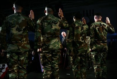 Vice President Dick Cheney administers the Ceremonial Oath of Re-enlistment at a rally for the troops at Fort Leavenworth, Kansas, January 6, 2006. Prior to the ceremony the Vice President delivered remarks and commended the troops for their service in Iraq, Afghanistan and in the war on terrorism. Fort Leavenworth holds the title as the oldest Army installation in continuous active service west of the Mississippi.