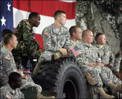 Soldiers from the Iowa Air and Army National Guard listen as Vice President Dick Cheney delivers remarks, Monday, July 17, 2006, at Camp Dodge in Johnston, Iowa. Camp Dodge, home of the National Maintenance Training Center, trains all of the Army, Army National Guard and Army Reserve maintenance companies in the United States.