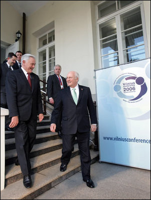Vice President Dick Cheney and Lithuanian President Valdus Adamkus walk together after the conclusion of a bilateral meeting Wednesday, May 3, 2006 in Vilnius, Lithuania. The Vice President was welcomed to the Presidential Palace to discuss regional issues prior to Thursday's Vilnius Conference 2006, a summit gathering leaders of the Baltic and Black Sea regions.