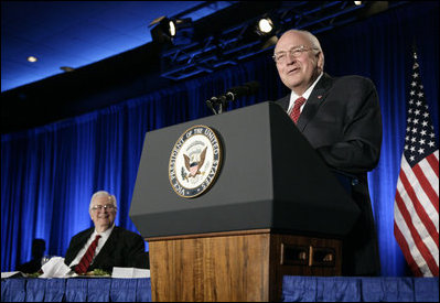 Vice President Dick Cheney tells a joke during remarks at the Jesse Helms Center Salute to Chairman Henry Hyde, Tuesday, September 19, 2006 in Washington, D.C. Joining the Vice President on stage is Rep. Henry Hyde, R-Ill., who has served in the U.S. Congress for more than 30 years.