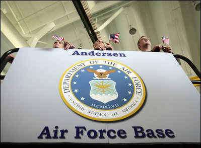 U.S. troops at Andersen Air Force Base, Guam listen from atop a hydraulic lift as Vice President Dick Cheney delivers remarks during a rally, Thursday, Feb. 22, 2007.