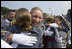 Graduates of the U.S. Military Academy Class of 2007 embrace Saturday, May 26, 2007, at the completion of commencement ceremonies in West Point, N.Y.