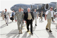 Vice President Dick Cheney walks with General David Petraeus, Commander of U.S. forces in Iraq, upon arrival to Baghdad Wednesday, May 9, 2007. The Vice President began a trip to the Middle East with an unannounced visit to Iraq to meet with Iraqi officials and U.S. leadership.