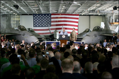 Vice President Dick Cheney addresses U.S. troops during a rally, Friday, May 11, 2007, aboard the aircraft carrier USS John C. Stennis in the Persian Gulf. "I've been around for a while - so long, in fact, that I even knew Senator John Stennis personally," said the Vice President, adding, "but I've never been more proud of the United States military than I am today. It's an incredibly challenging time for the country, and there's serious work being done on many fronts. You're doing all that we ask of you, and you're doing it with skill and with honor."