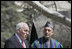With President Hamid Karzai of Afghanistan looking on, Vice President Dick Cheney delivers a statement to the press Thursday, March 20, 2008 on the grounds of Gul Khana Palace in Kabul. "During the last six years, the people of Afghanistan have made a bold and confident journey, throwing off the burden of tyranny, winning your freedom and reclaiming your future," said the Vice President, adding, "The United States of America has proudly walked with you on this journey, and we walk with you still." 