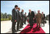 Vice President Dick Cheney greets Iraqi Kurdish officials Tuesday, March 18, 2008 upon arrival to the residence of the president of the Kurdish Regional Government in Irbil, Iraq.