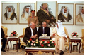 Vice President Dick Cheney joins Amir Hamad bin Khalifa Al-Thani of Qatar, right, and translator Gamal Helal, center, in a private meeting at Wajbah Palace in Doha, Qatar, March 17.
