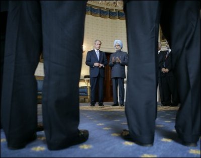 President George W. Bush and India's Prime Minister Manmohan Singh meet U.S.-India CEO Forum Members, Monday, July 18, 2005, in the Blue Room of the White House.
