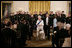 President George W. Bush escorts Her Majesty Queen Elizabeth II of Great Britain from the East Room of the White House Monday evening, May 7, 2007, at the conclusion of the State Dinner's entertainment by the U.S. Army Chorus. White House photo by Shealah Craighead