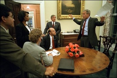  Working with his senior staff, President Bush goes over the speech he will deliver to the nation later that evening from the Oval Office Sept. 11, 2001. 