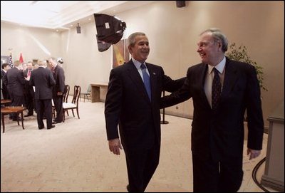 President George W. Bush and Canadian Prime Minister Paul Martin share a light moment after a bilateral meeting in Santiago, Chile, Nov. 20, 2004. President Bush and Prime Minister Martin are joined in Chile by the leaders of 19 other countries attending this year's APEC summit.