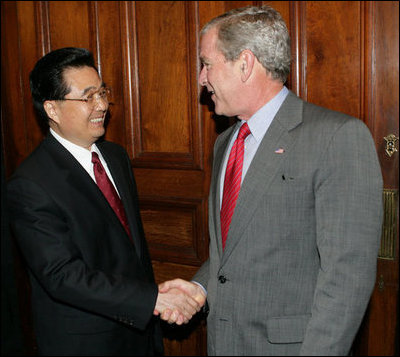 President George W. Bush greets China’s President Hu Jintao Thursday, Sept. 6, 2007, as the two leaders met in Sydney, where they will join fellow APEC leaders Friday for the 2007 summit.