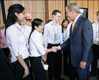 President George W. Bush greets APEC staff outside the Concert Hall at the Sydney Opera House Friday, Sept. 7, 2007, after addressing the APEC Business Summit.