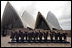 President George W. Bush joins fellow APEC leaders for the official portrait Saturday, Sept. 8, 2007, in front of the Sydney Opera House. 