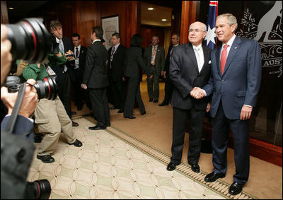 President George W. Bush and Prime Minister John Howard of Australia, shake hands as they meet for the start of a daylong visit Wednesday, Sept. 5, 2007, at the Commonwealth Parliament Offices in Sydney.