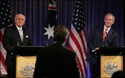 President George W. Bush and Prime Minister John Howard of Australia, listen to a reporter's question Wednesday, Sept. 5, 2007, during a joint press availability at the InterContinental Hotel in Sydney. President Bush met with the Prime Minister for a day's worth of meetings before joining him during the 2007 APEC summit later in the week.