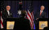 President George W. Bush and Prime Minister John Howard of Australia, listen to a reporter's question Wednesday, Sept. 5, 2007, during a joint press availability at the InterContinental Hotel in Sydney. President Bush met with the Prime Minister for a day's worth of meetings before joining him during the 2007 APEC summit later in the week.