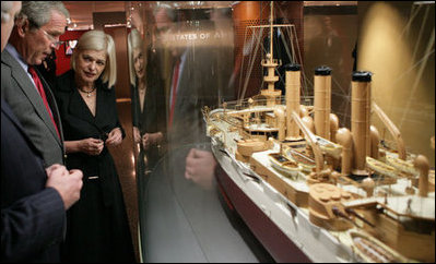 President George W. Bush listens as Mary-Louise Williams, director of the Australian National Maritime Museum, describes one of the exhibits on display during a tour Thursday, Sept. 6, 2007, in Sydney.