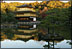 The Golden Pavilion Kinkakuji Temple is reflected in the pool as the sun rises over Kyoto, Japan, Wednesday, Nov. 16, 2005.
