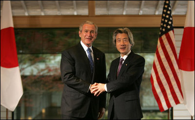 President George W. Bush and Prime Minister Junichiro Koizumi of Japan, shake hands Wednesday, Nov. 16, 2005, prior to their meeting at the Kyoto State Guest House in Kyoto, Japan.