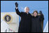 President and Mrs. Bush wave from the top of the steps as they deplane Air Force One Monday, Nov. 21, 2005, in Ulaanbaatar, Mongolia. The stop marks the first time a working U.S. president has visited the country. 