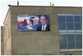 A sign welcoming "George and Laura" to Mongolia adorns a building at Buyant-Ukhaa Airport in Ulaanbaatar, Mongolia, as the President and First Lady arrived on the last stop of their Asia tour. 