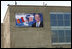 A sign welcoming "George and Laura" to Mongolia adorns a building at Buyant-Ukhaa Airport in Ulaanbaatar, Mongolia, as the President and First Lady arrived on the last stop of their Asia tour. 