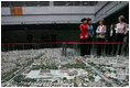 A model of the future Beijing sits in the foreground as Mrs. Bush and Sarah Randt, wife of the U.S. Ambassador to China, tour the Beijing Urban Planning Museum Sunday, Nov. 20, 2005, in Beijing.