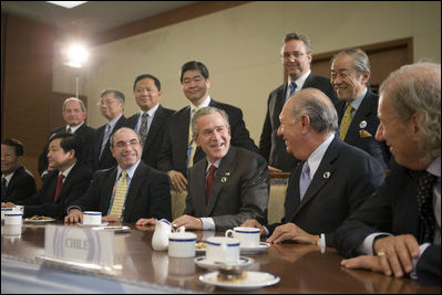 President George W. Bush and fellow APEC leaders participate in a dialogue with members of the APEC Business Advisory Council Friday, Nov. 18, 2005, prior to the opening of the 2005 APEC conference.