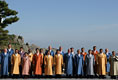 Leaders of the Asian Pacific Economic Cooperation stand for the official 2005 APEC photograph Saturday, Nov. 19, 2005, at the Nurimaru APEC house in Busan, Korea. The photograph came on the final day of the two-day economic summit.