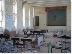 In addition to neglect, Saddam stored weapons and artillery in many schools. Saddam's soldiers also destroyed schools during the war as they used them as a base. Schools and other buildings were also looted.
