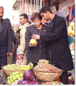 Agriculture Secretary Ann M. Veneman tours market in Erbil, Iraq. "The people of Iraq need to restore their way of life, and we are ready to help them be a part of the global system," said Veneman.