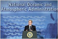 President George W. Bush speaks during a visit to the National Oceanic and Atmospheric Administration Feb. 14. "America and the world share this common goal: we must foster economic growth in ways that protect our environment," said the President as he announced new initiatives to foster economic growth while protecting the environment. 