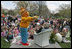 White House Chief of Staff Josh Bolten gets a little help from Arthur in telling his tale of, "Arthur Meets the President," by Marc Brown Monday, April 9, 2007, on the South Lawn during the 2007 White House Easter Egg Roll. White House photo by Joyce Boghosian