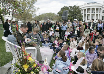 Actor Stephen Baldwin asks a little reader for some help as he reads the children's book, "The Jolly Postman," by Alan Alhberg Monday, April 9, 2007, on the South Lawn during the 2007 White House Easter Egg Roll. White House photo by Joyce Boghosian