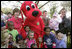 Mrs. Bush poses with children and Clifford the Big Red Dog on the South Lawn during the 2007 White House Easter Egg Roll Monday, April 9, 2007. There were many children's characters in attendance including Charlie Brown, Bugs Bunny, Arthur, and Curious George. White House photo by Shealah Craighead