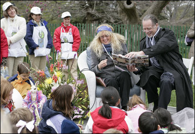 Children book authors Mary Pope Osborne and her husband Will Osborne read aloud to an ethusiastic crowd of young readers from her book, 