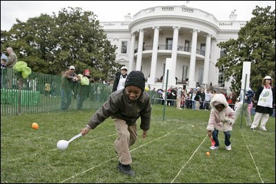Eggs roll, drop, hop and even fly as children take part in the traditional mainstay of the 2007 White House Easter Egg Roll on the South Lawn Monday, April 9 2007. White House photo by Shealah Craighead