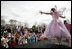 Children gather at the Magic Stage on the South Lawn of the White House to watch magician Fairy Twinkletoes perform Monday, March 24, 2008, during the 2008 White House Easter Egg Roll.