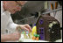 White House pastry chef Bill Yosses, carefully places white chocolate rabbits on a section of the chocolate egg village Friday, March 21, 2008 in the White House pastry kitchen, prepared for Monday's 2008 White House Easter Egg Roll.
